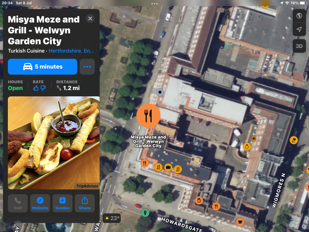 On this screenshot is the information box for Misha Meze and Grill and a satellite map image of the area in town where the restaurant is marked.